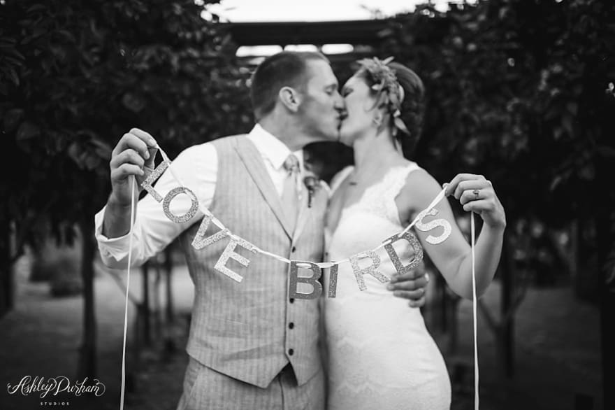 fun pictures to get with brides and grooms, sparrows lodge palm springs wedding, love birds garland, DIY garland