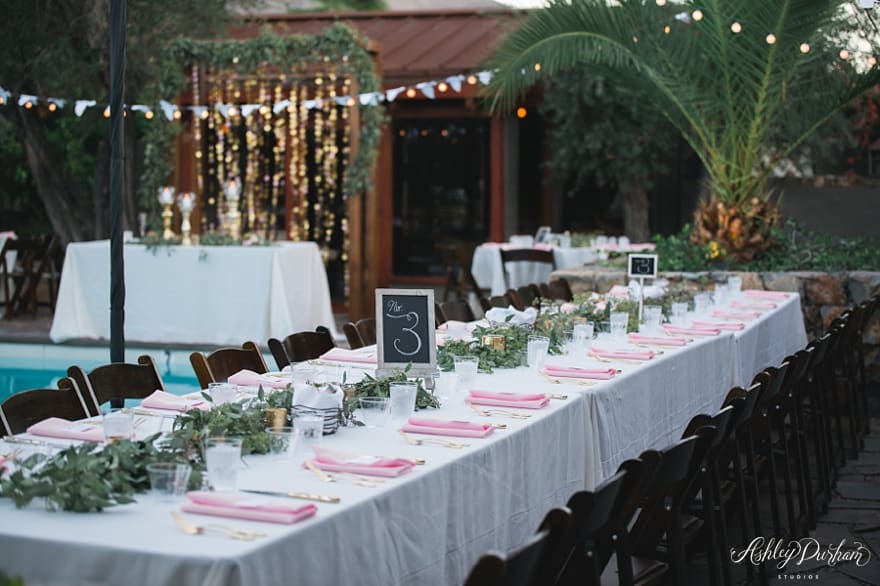 bohemian wedding ceremony, eucalyptus garland, pink and gold tablescapes, artisan events palm springs, chalkboard table numbers