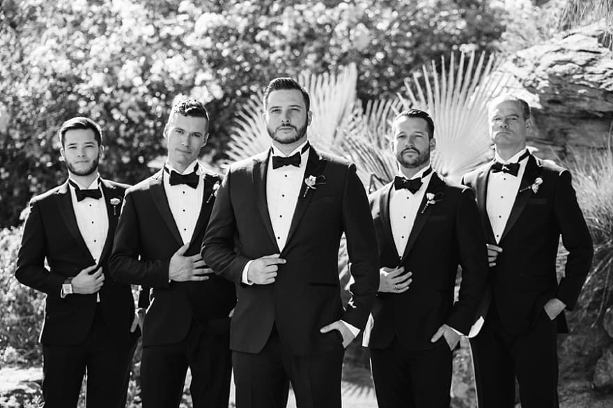 dapper groomsmen pose, classic groomsmen, wedding party in tuxedos