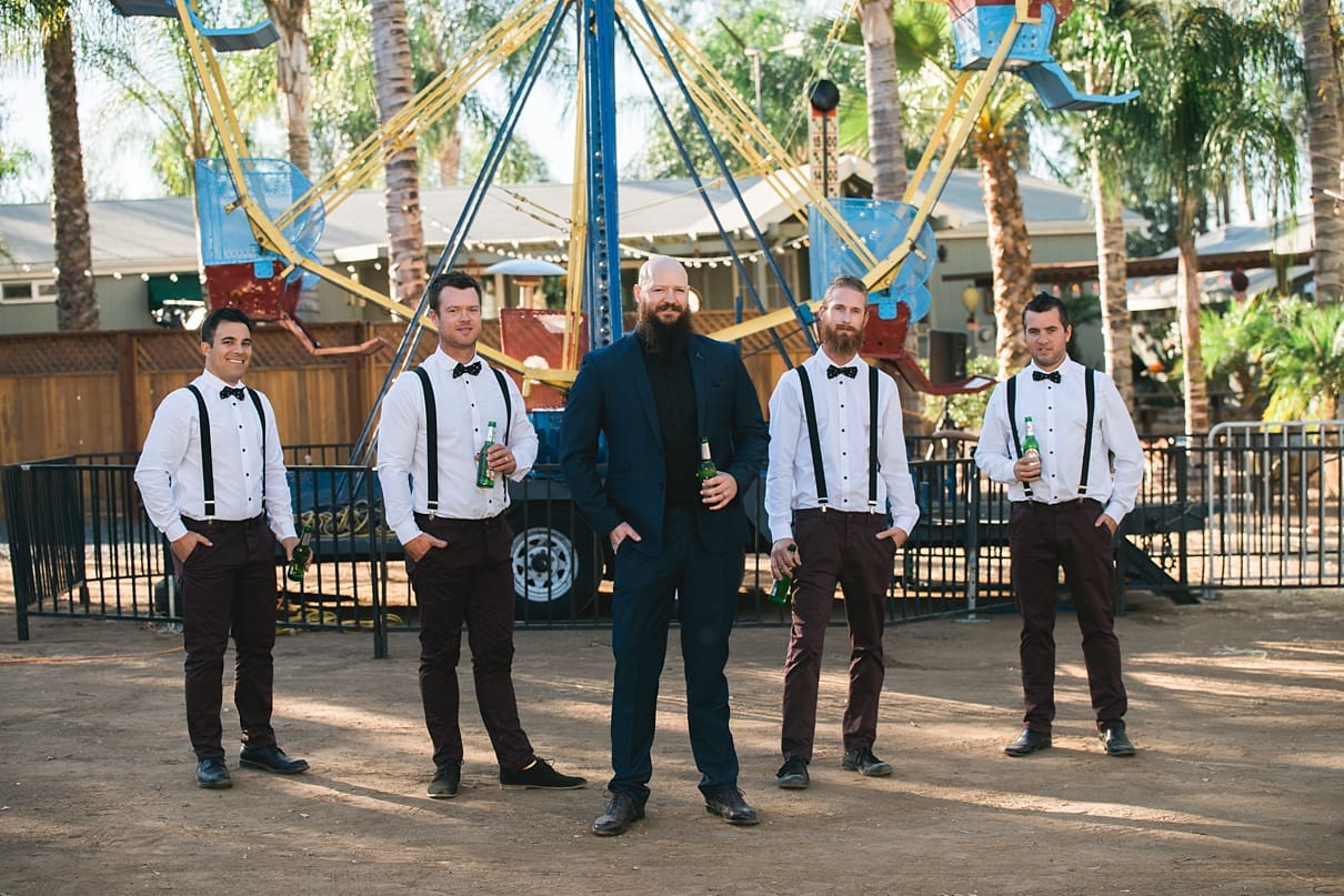backyard vintage carnival wedding, groomsmen with a ferris wheel, circus wedding, bow ties and suspenders