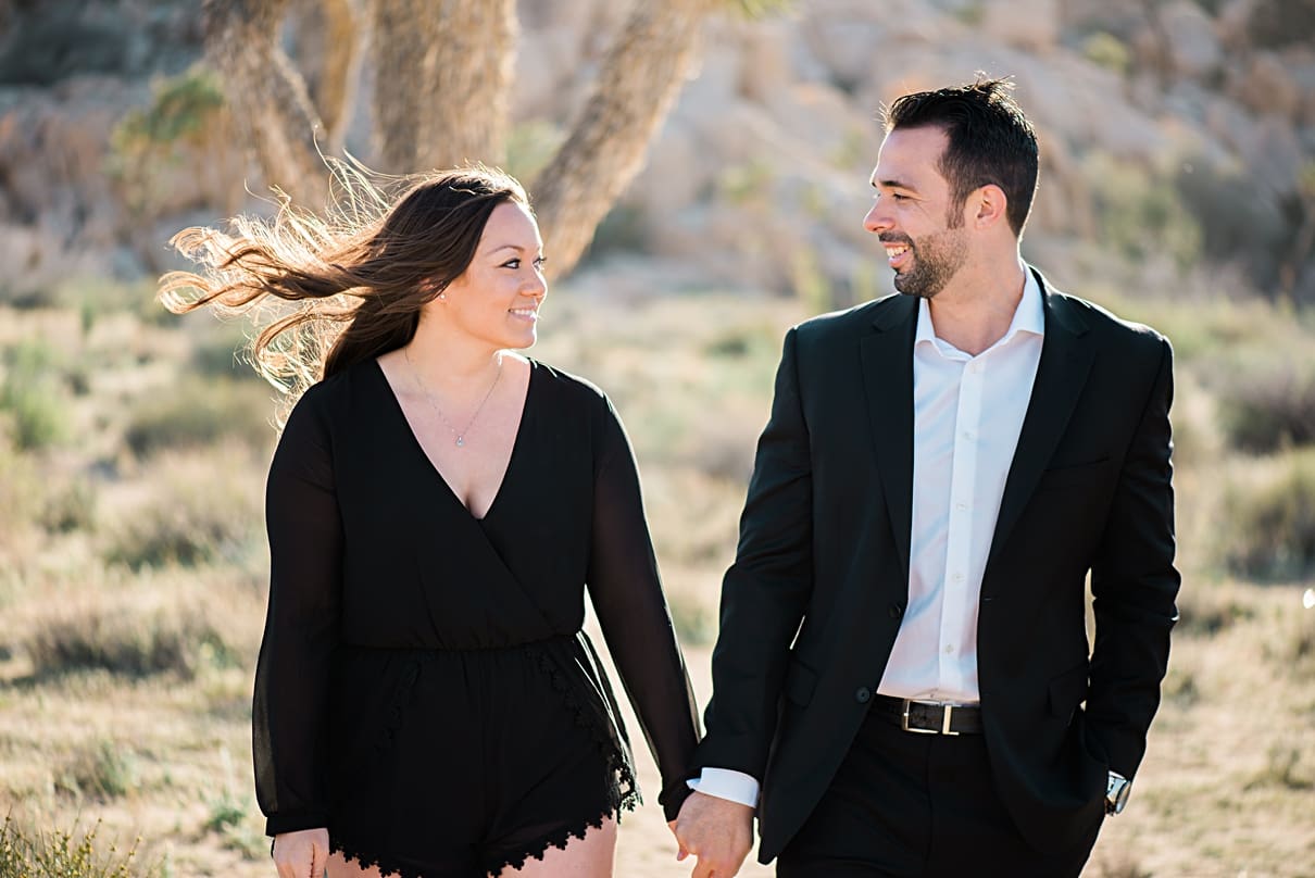 windy day engagement photos