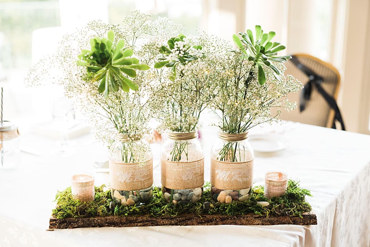 DIY moss and candle wedding centerpieces