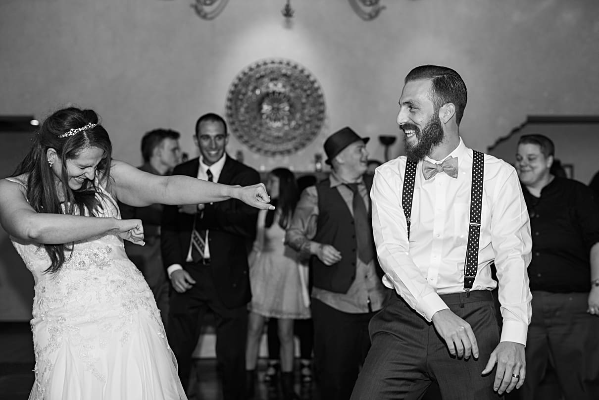 fun dancing photos bride groom wedding reception
