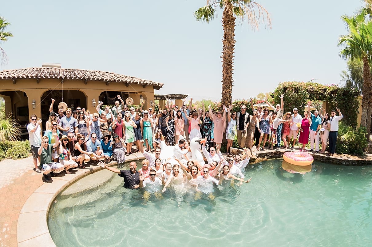 wedding party jumping in the water, wedding party by the pool