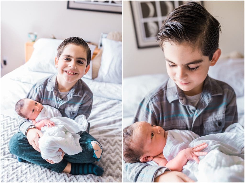 proud older brother with newborn brother