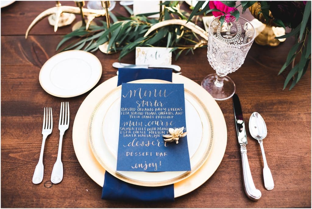 navy blue hand lettered menu for wedding