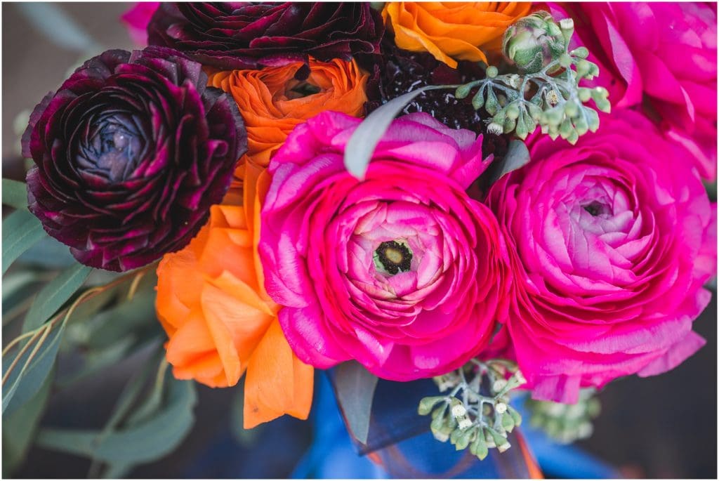 hot pink, orange and maroon wedding bouquet