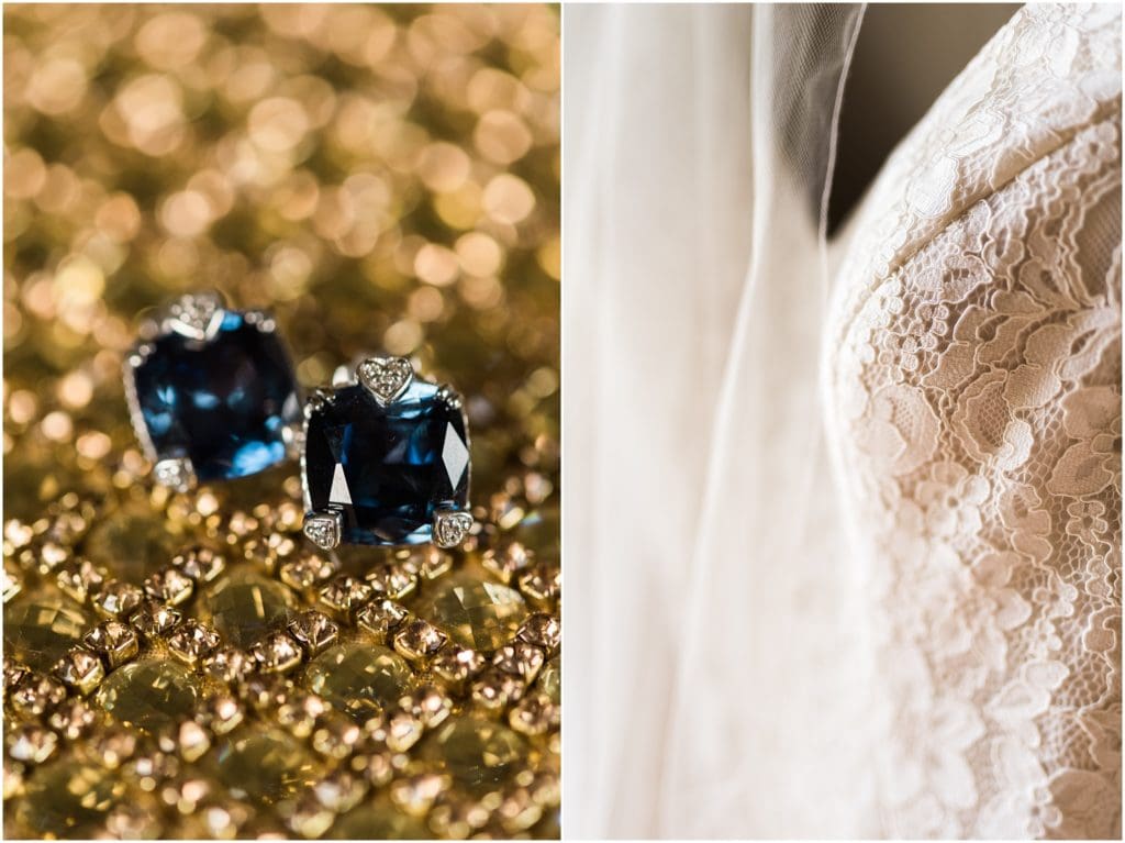 bridal details with sapphire earrings and lace wedding dress