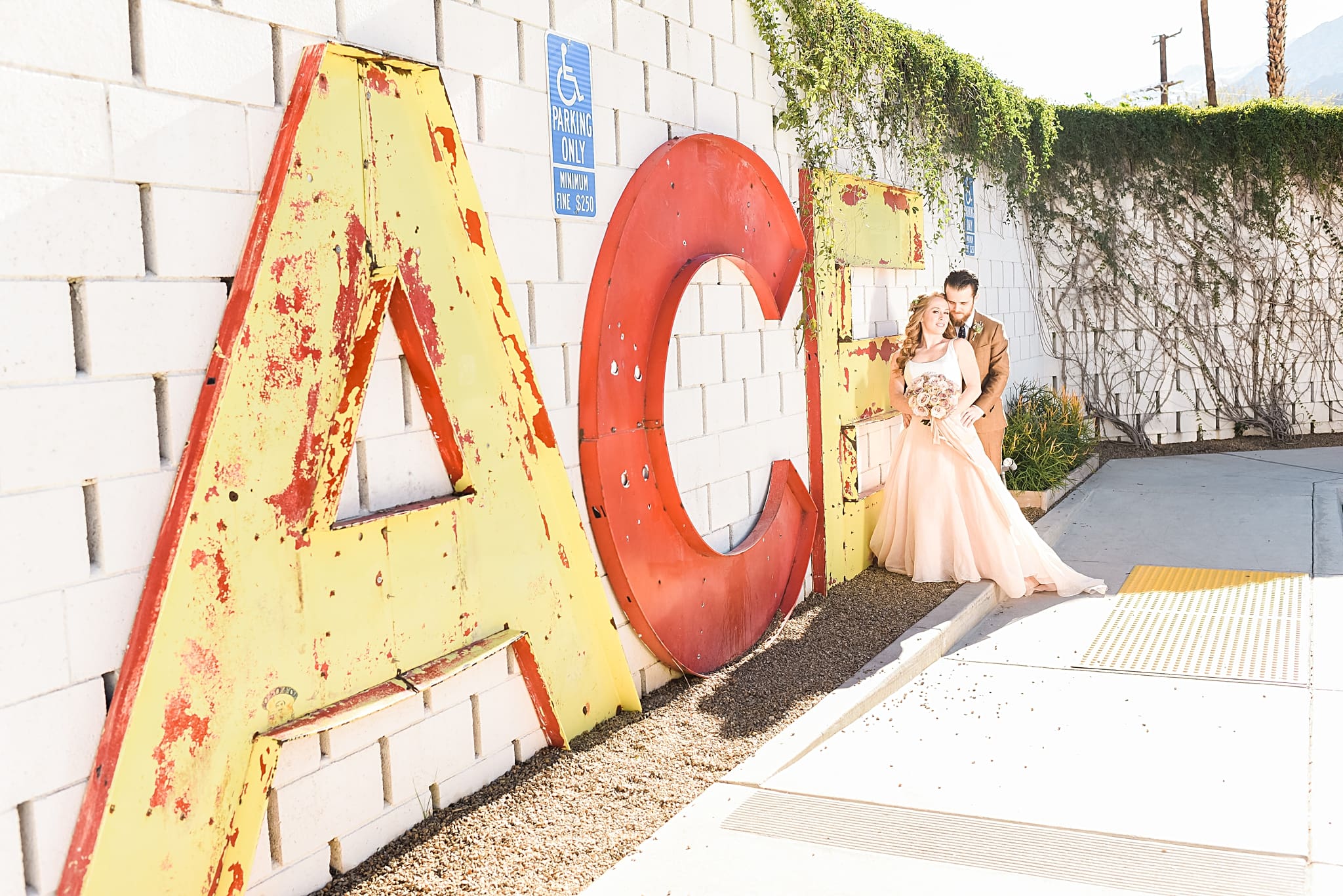 wedding couple with the ace hotel sign