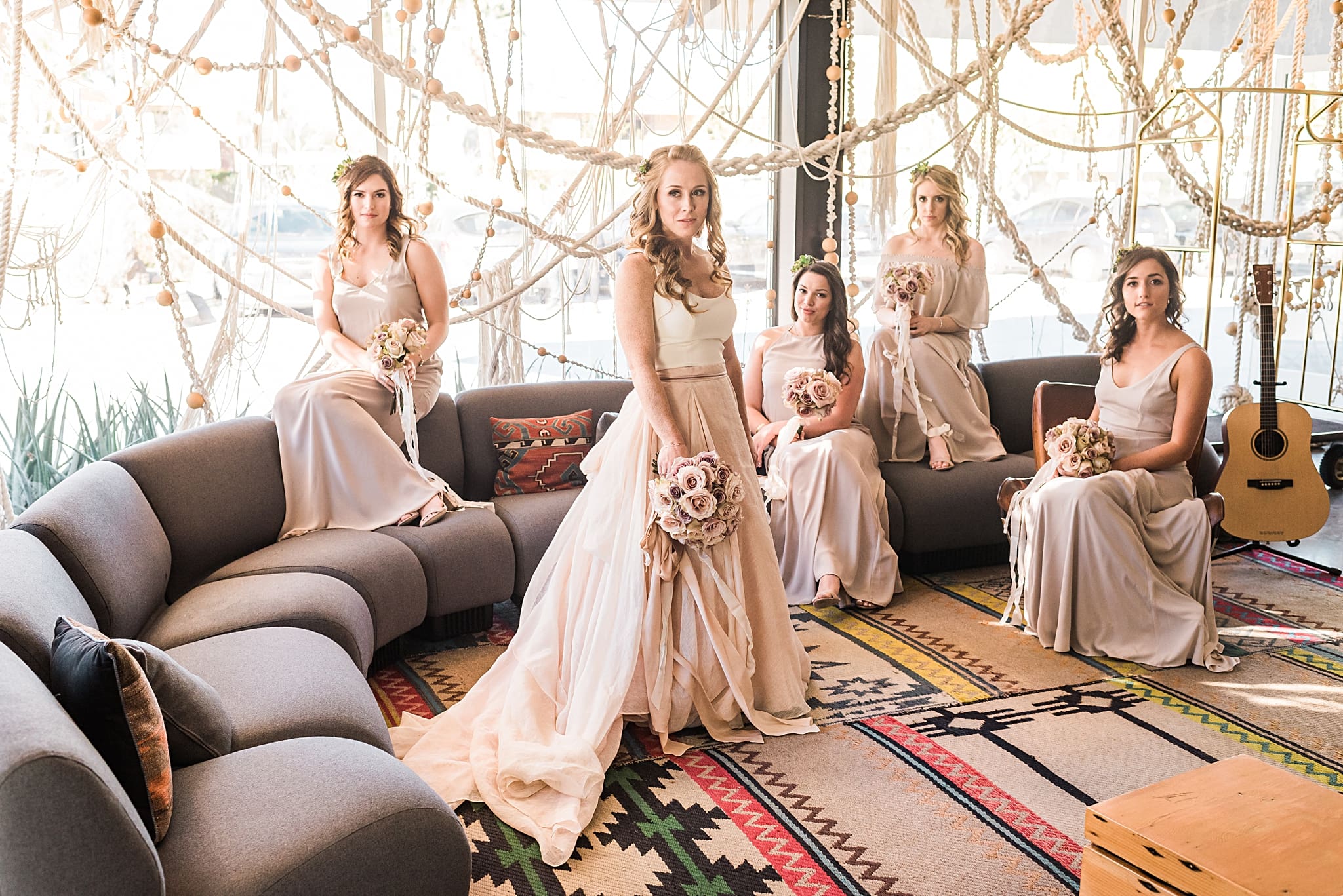 bride with bridesmaids in the ace hotel lobby