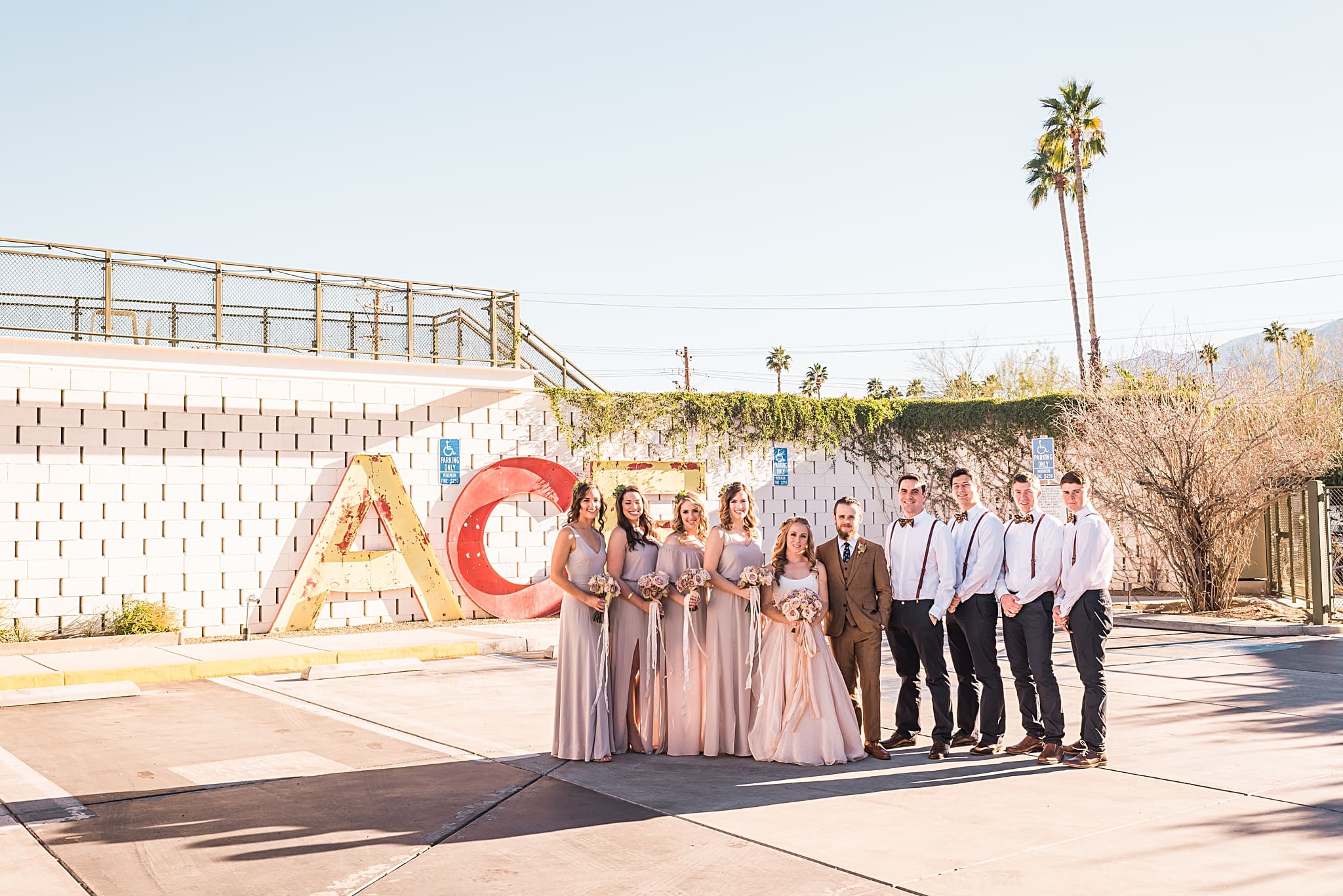 wedding party at the ace hotel sign in palm springs
