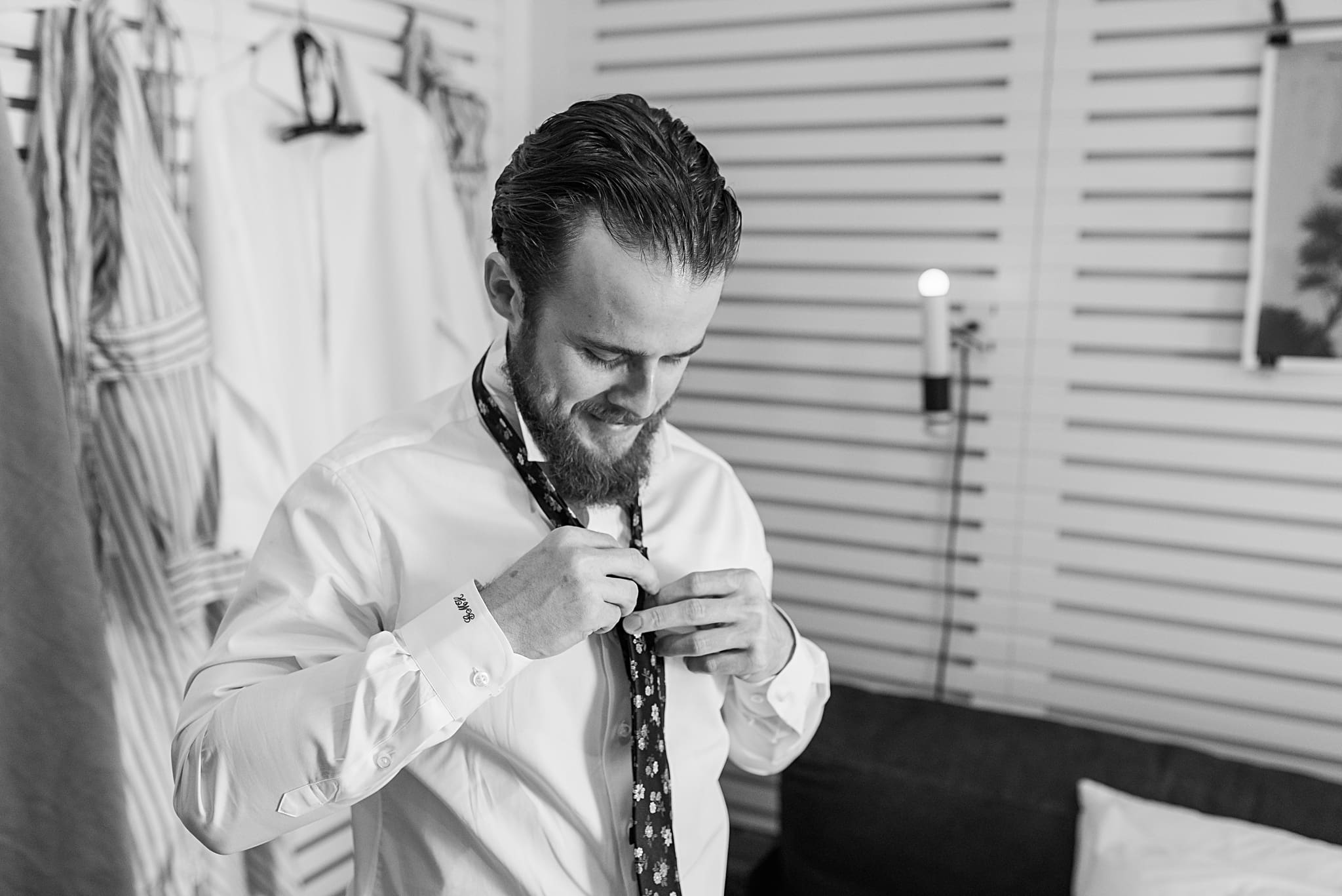 groom getting ready for ace hotel wedding in palm springs