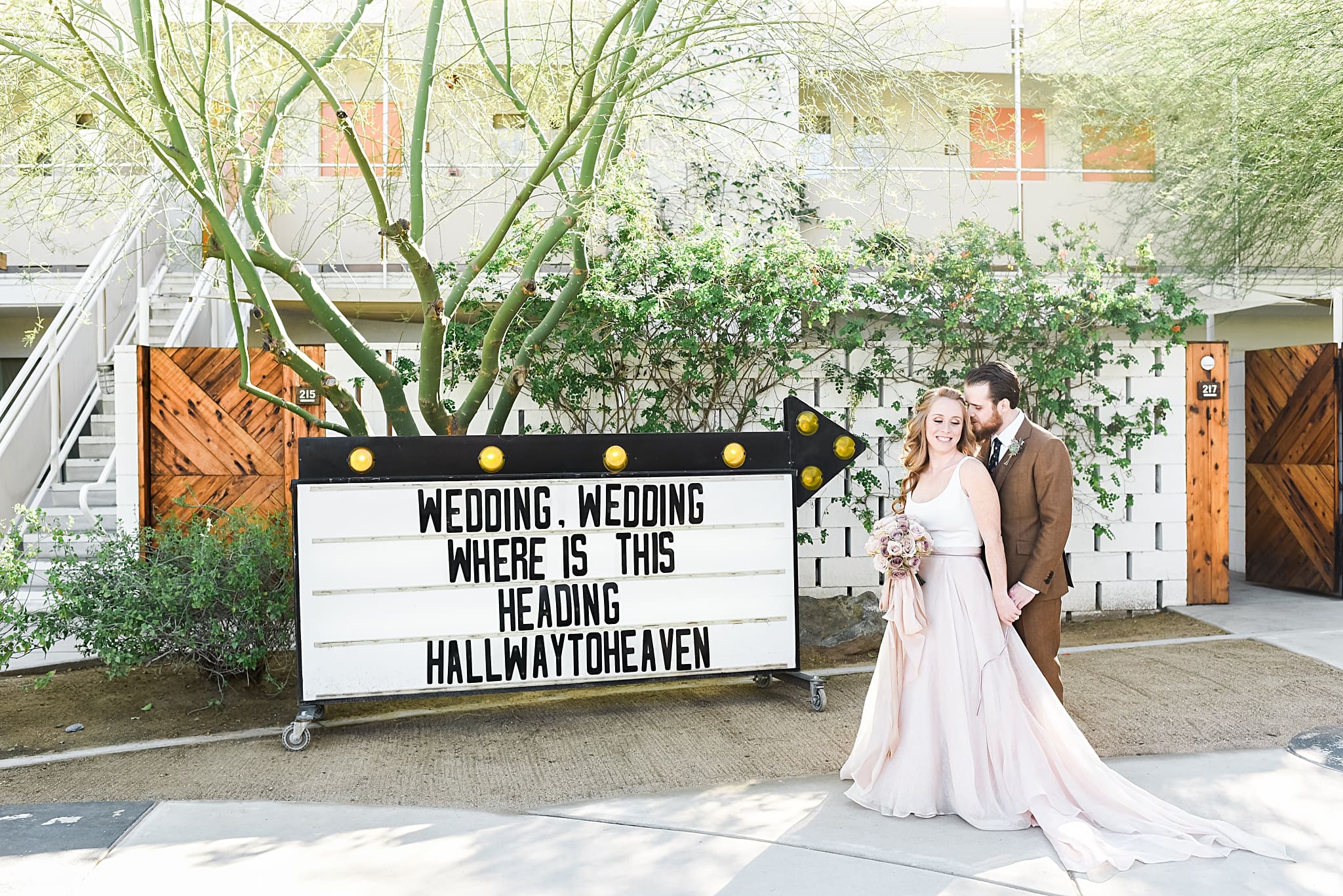 bride and groom with wedding marquee at ace hotel in palm springs, DIY Boho Ace Hotel Wedding