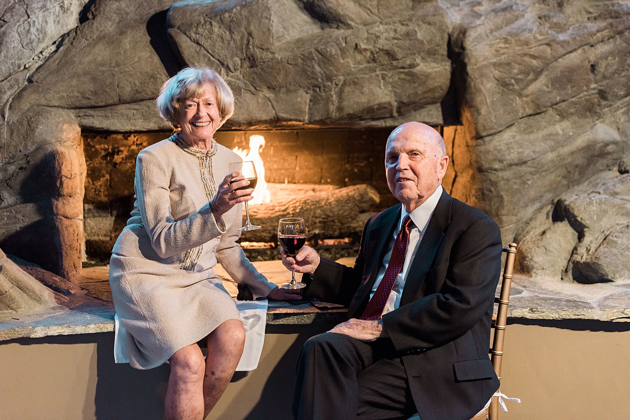 grandparents by the fire