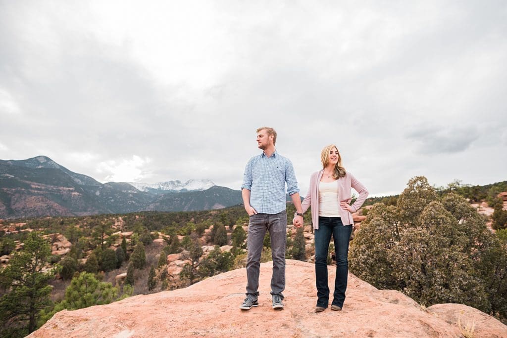 couple holding hands at garden of the gods