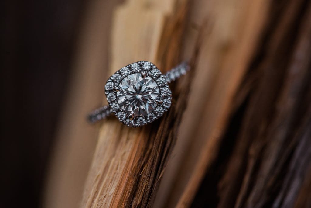engagement ring on split wood