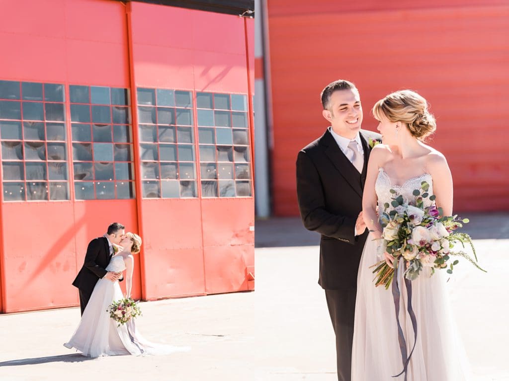 bride and groom outside the hangar at stanley
