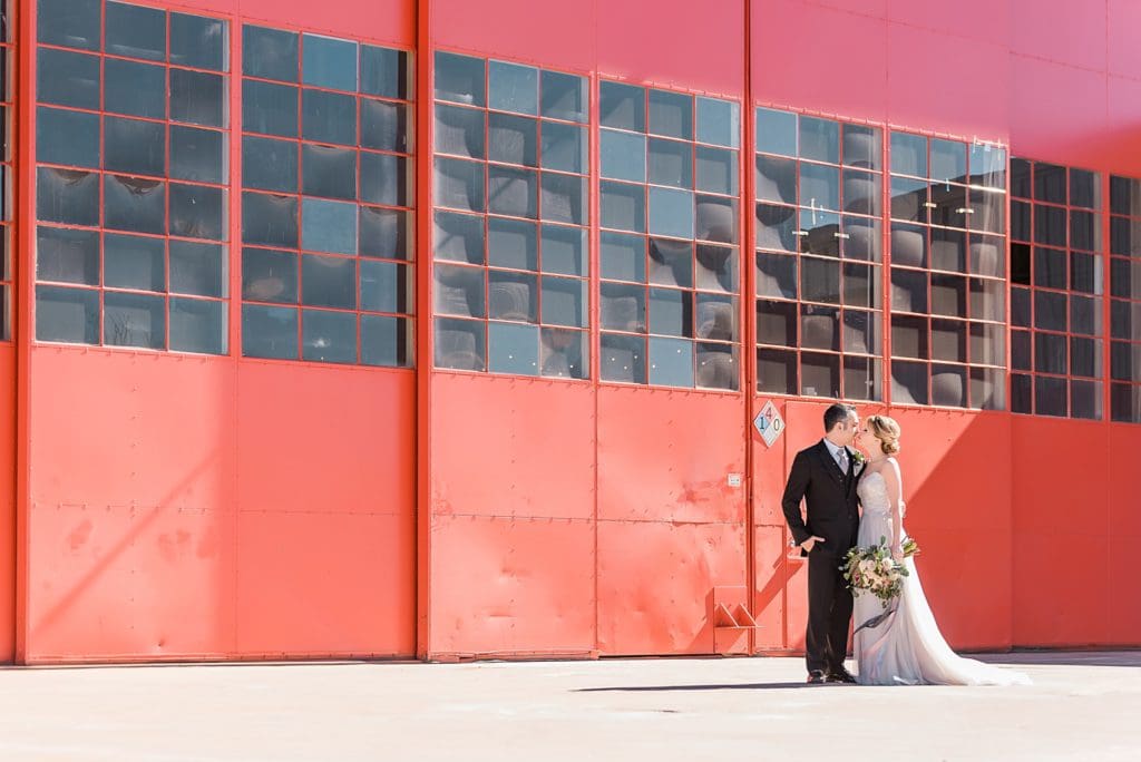 bride and groom at the hangar at stanley