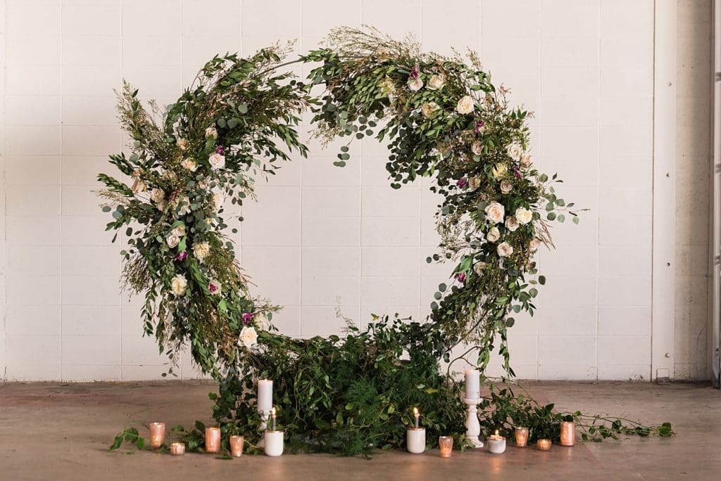round wedding arch with flowers