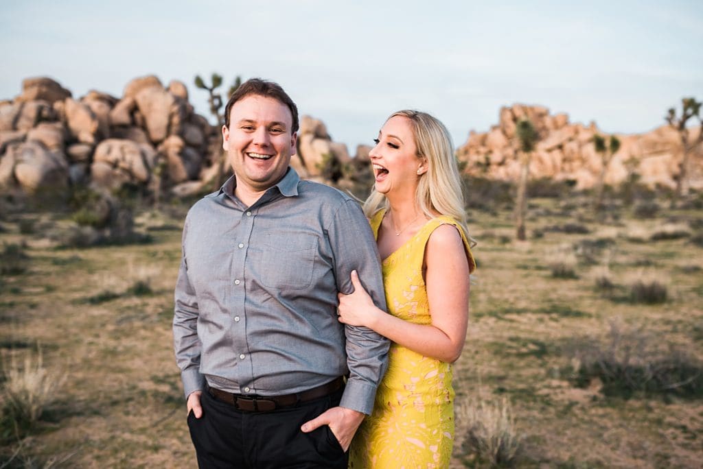 couple laughing together in joshua tree