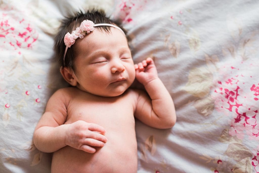 newborn girl with dainty flower headband