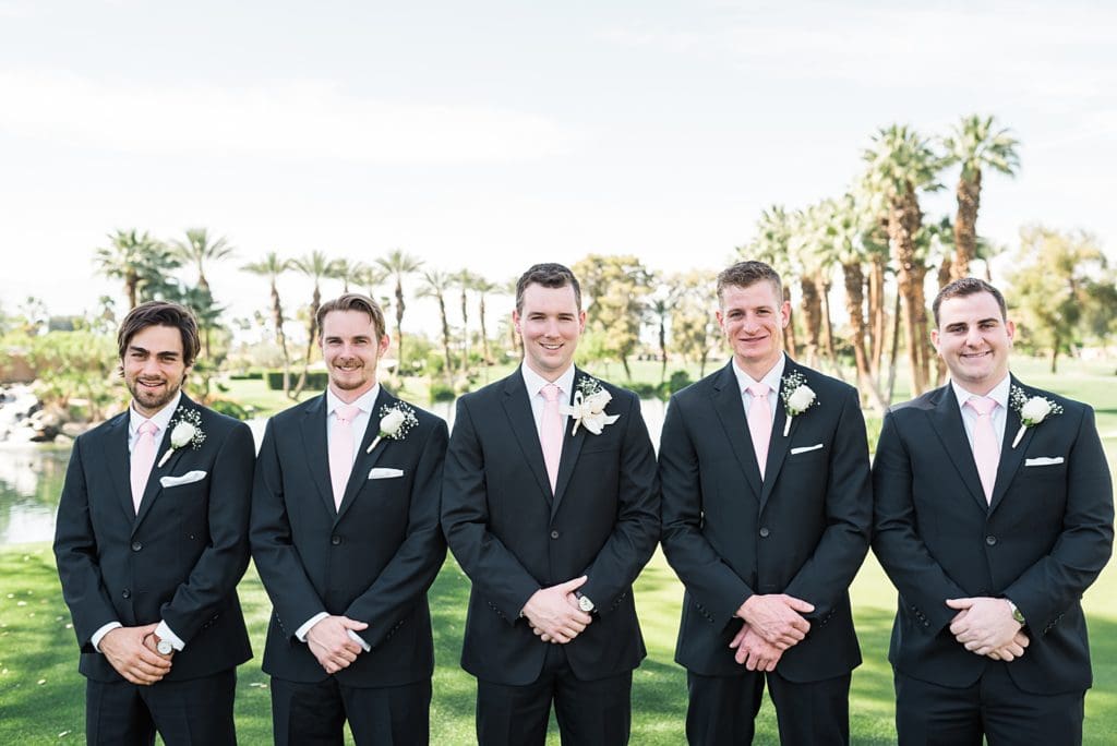 groomsmen portraits on the golf course