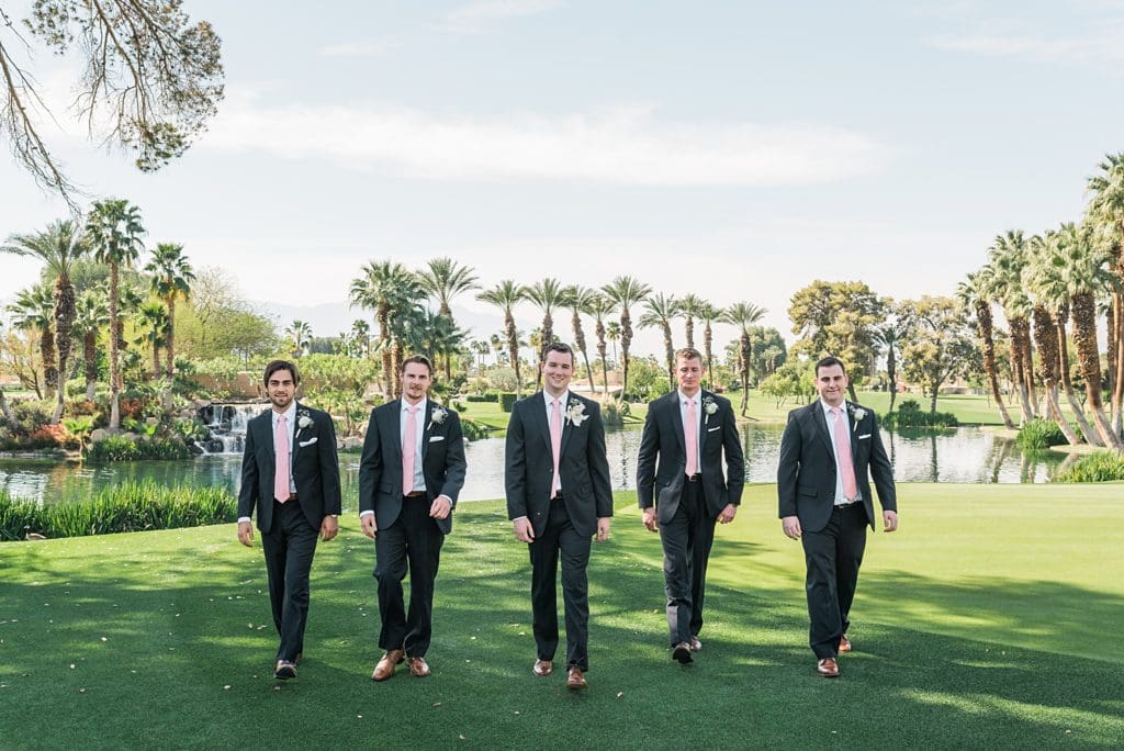 groomsmen portraits on the golf course