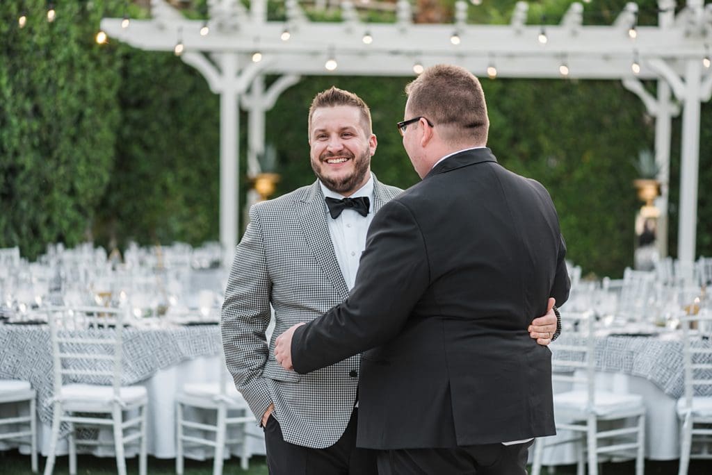 grooms seeing reception site for the first time