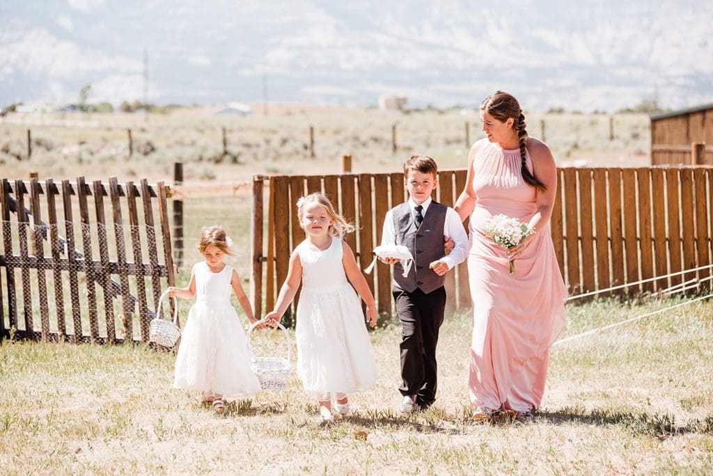 flower girls and ring bearers coming down aisle