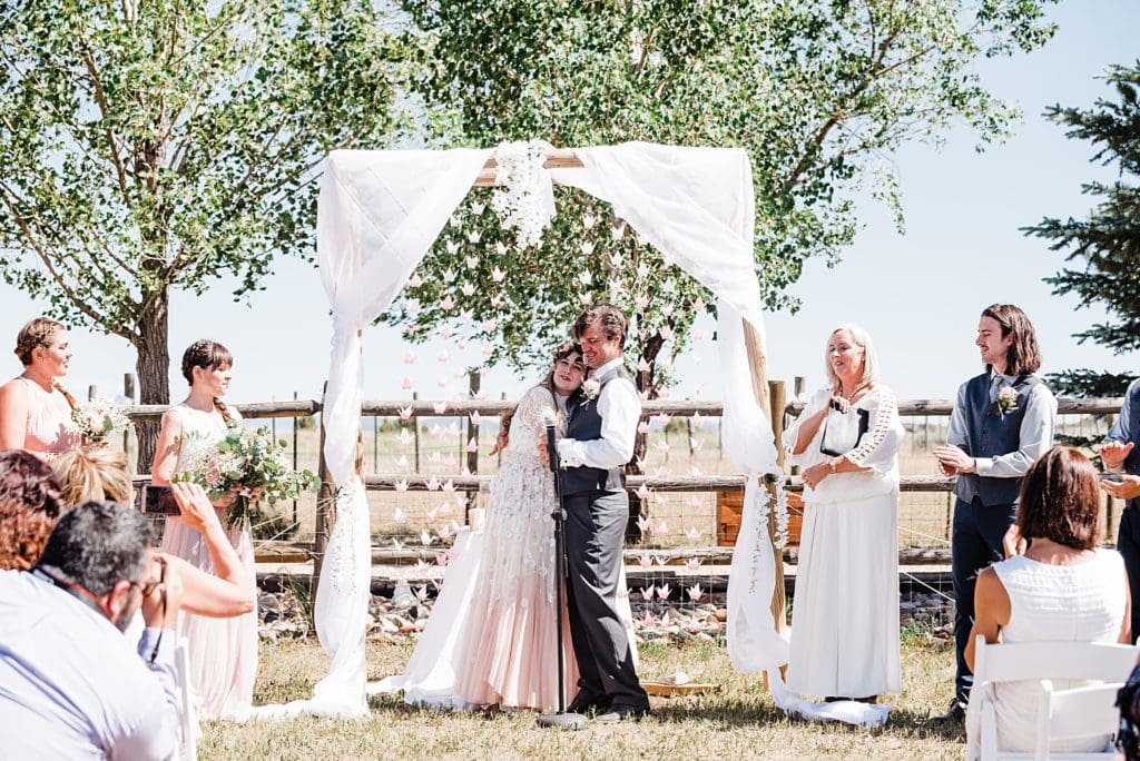 rocky mountain ranch outdoor wedding ceremony