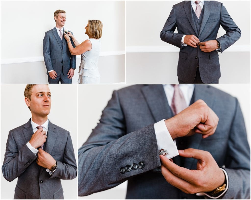 groom getting ready with ohio state cufflinks