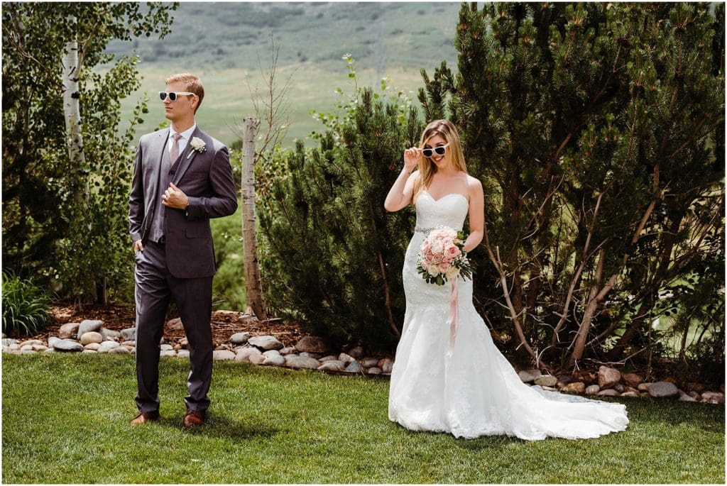 bride and groom wearing sunglasses