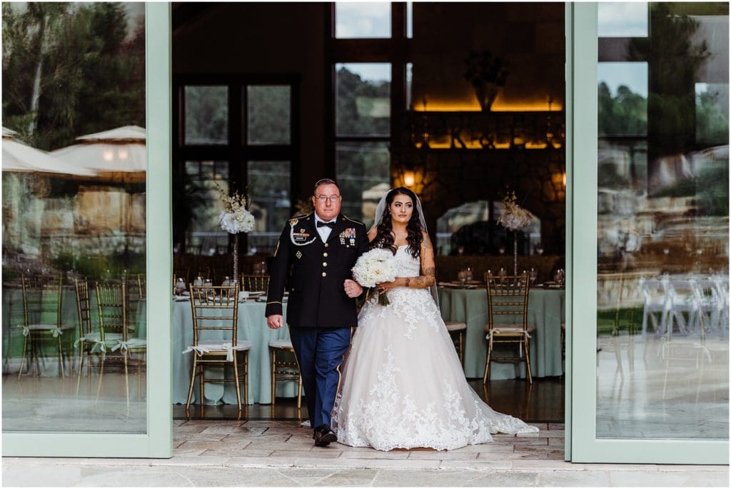 army dad walking daughter down the aisle