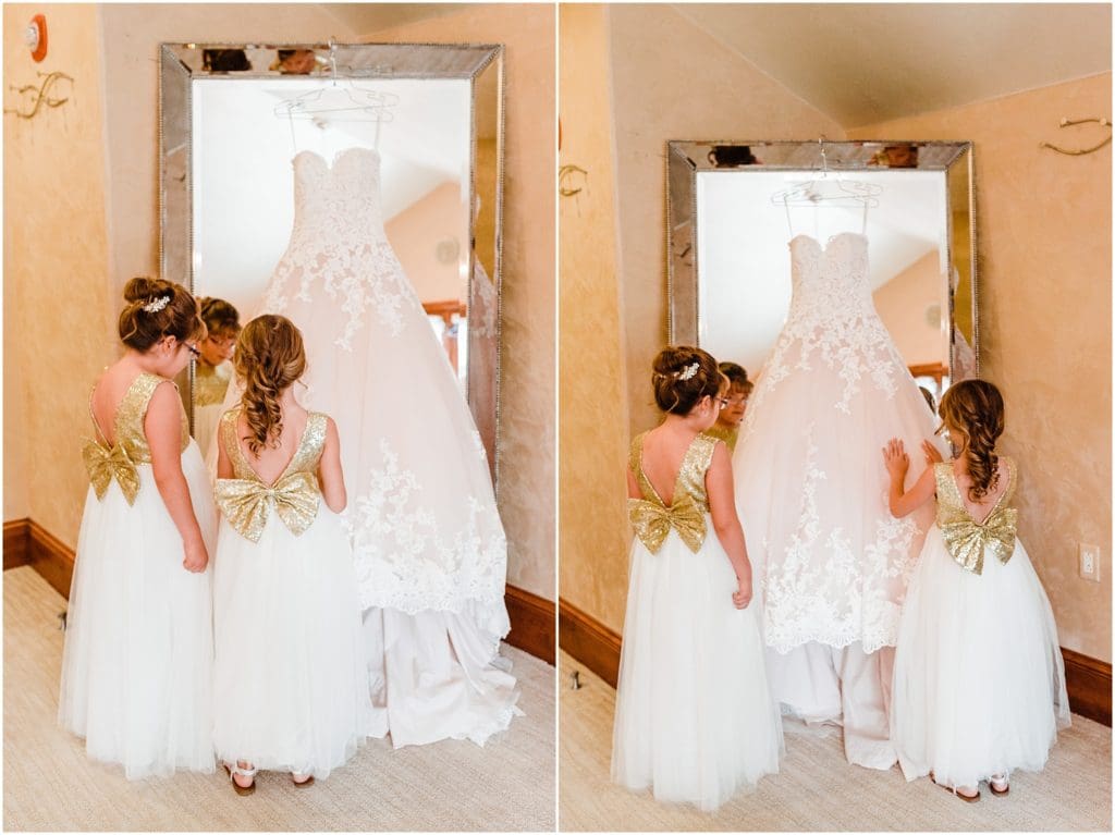 flower girls with bridal gown