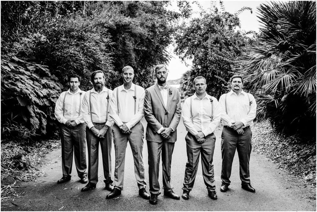 stoic black and white groomsmen party portrait