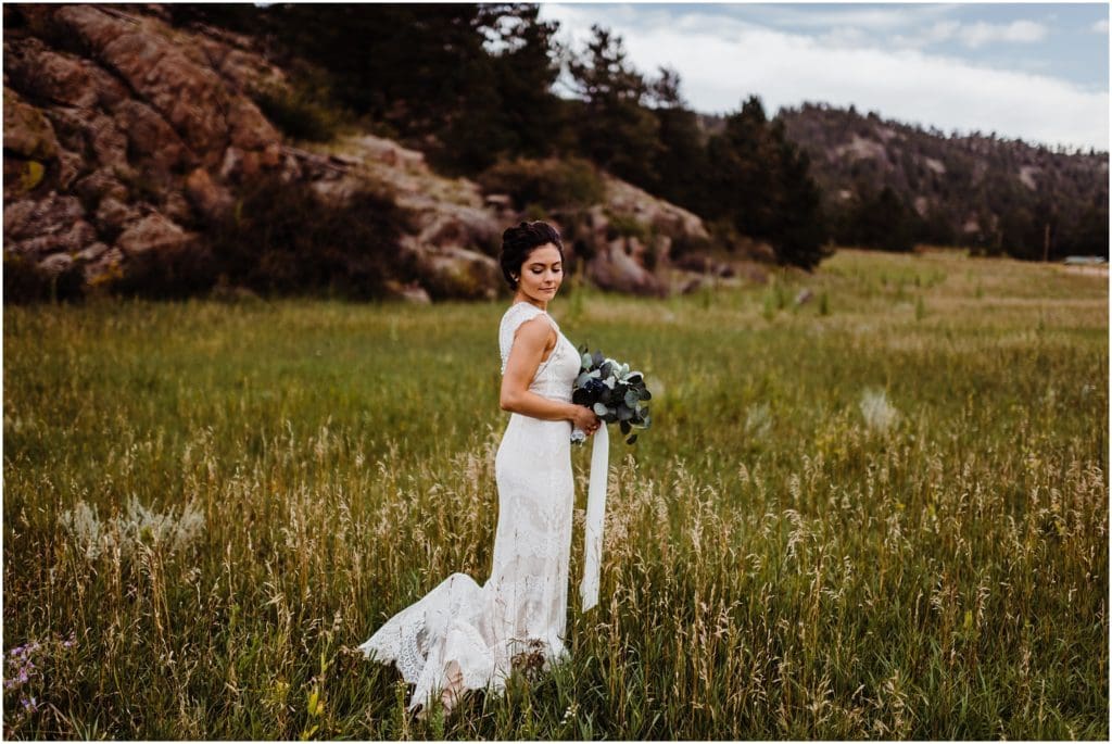 bride wearing bhldn gown for mountain wedding