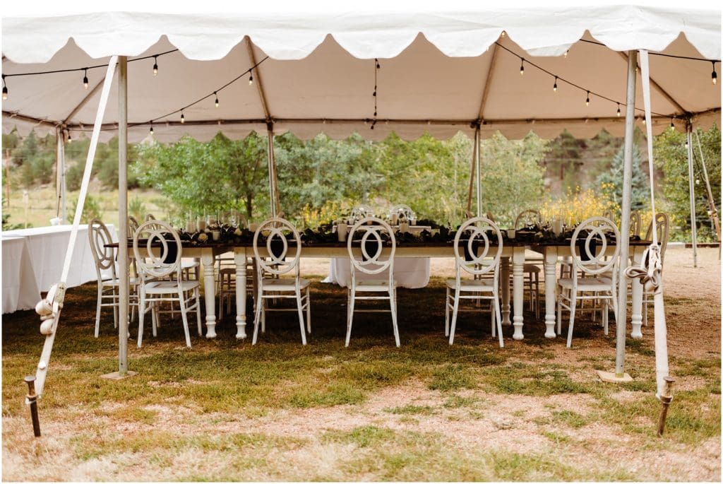 wedding reception under a white tent outside