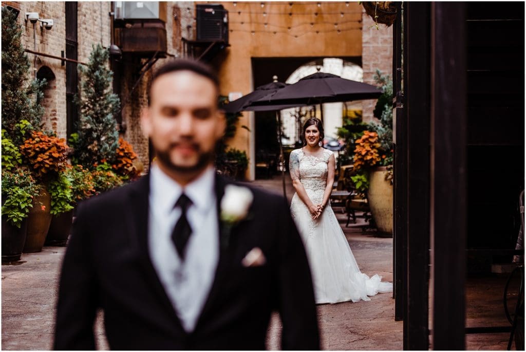 wedding first look in the alleyway at the mining exchange colorado springs