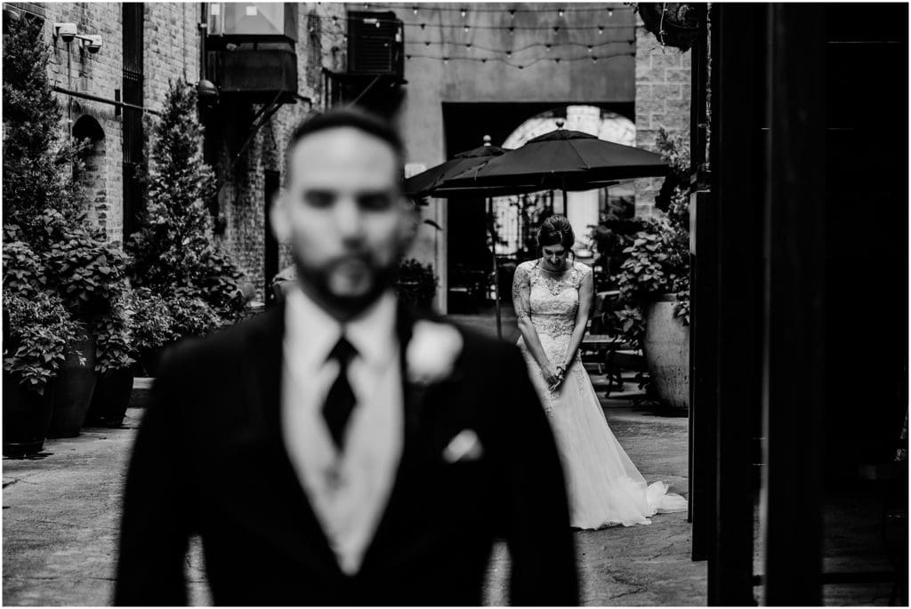 wedding first look in the alleyway at the mining exchange colorado springs