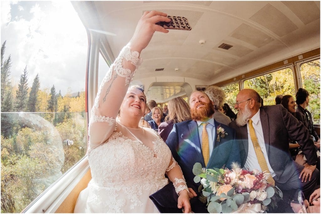 bride and groom taking a selfie