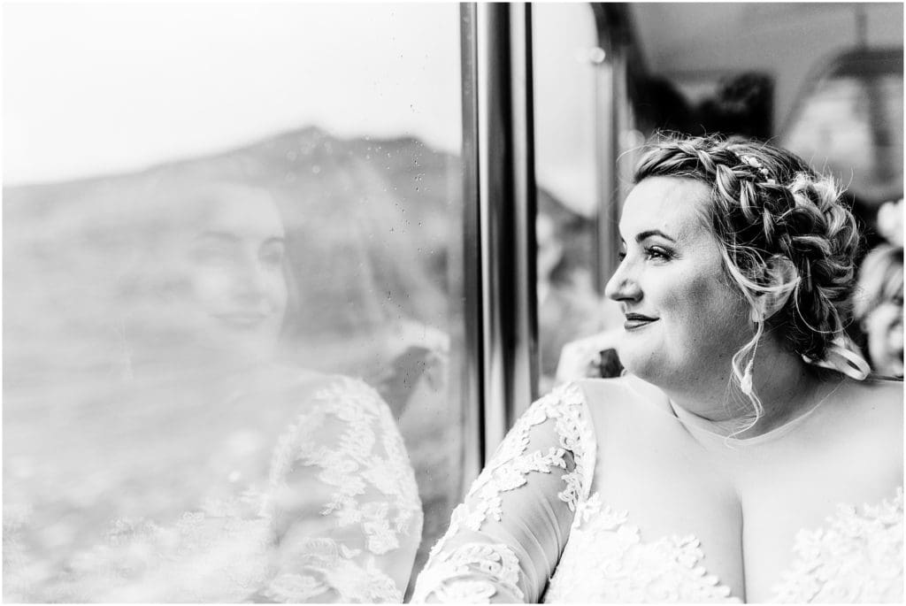 black and white window portrait of a bride