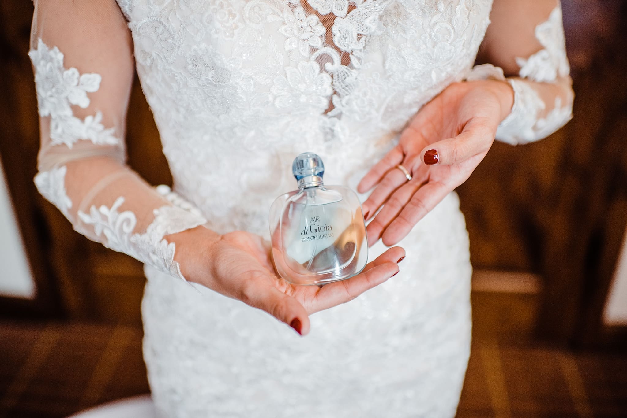 bride with perfume bottle