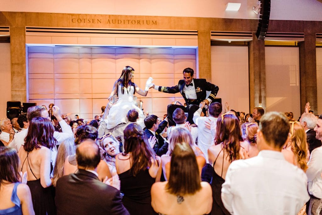 hora at jewish wedding reception at skirball center
