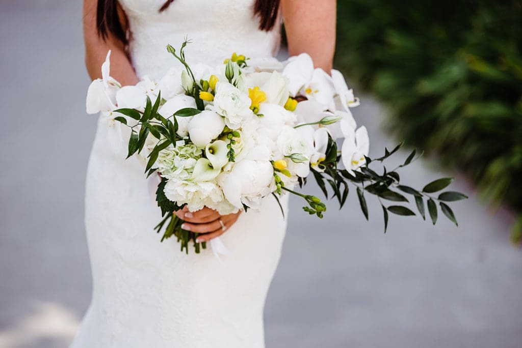 white bridal bouquet with pop of yellow