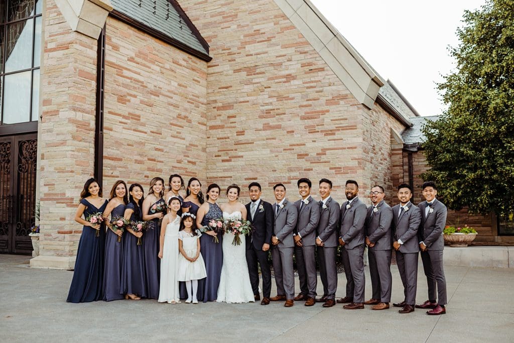large wedding party at cherry hills community church in highlands ranch