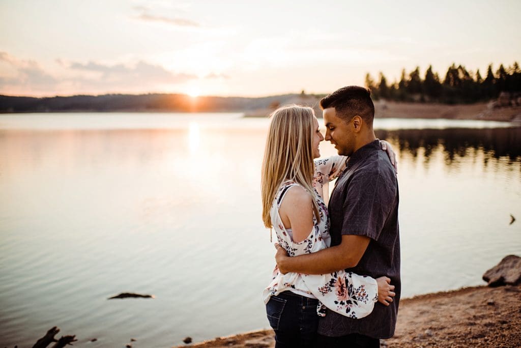 engagement photos at rampart reservoir in woodland park colorado