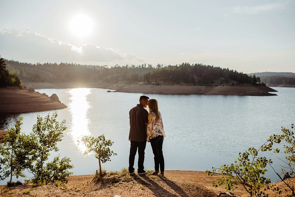 engagement photos at rampart reservoir in woodland park colorado