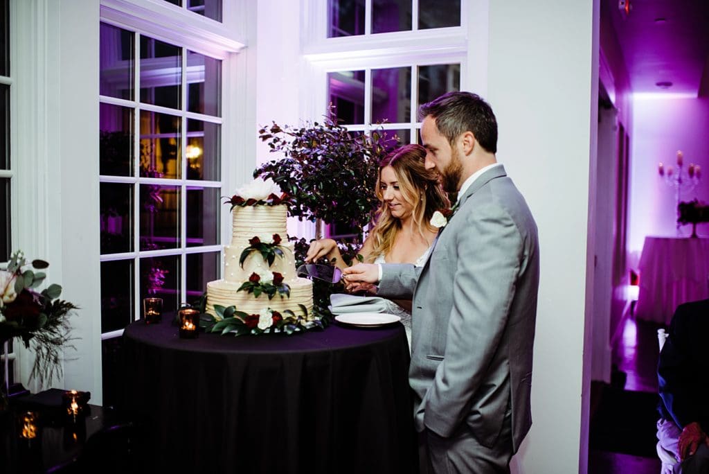 cake cutting at the manor house wedding