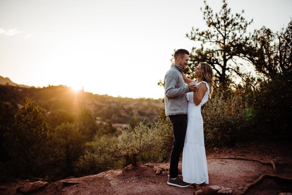 romantic sunrise engagement session at garden of the gods