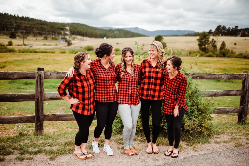 bridesmaids in matching red plaid